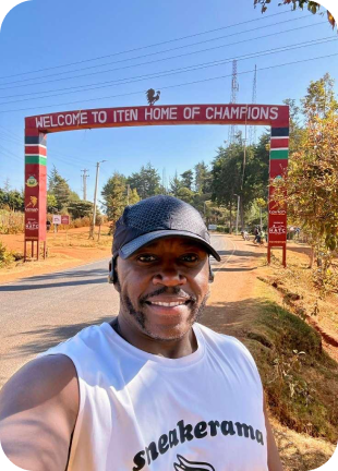Community member standing with sponsor support materials